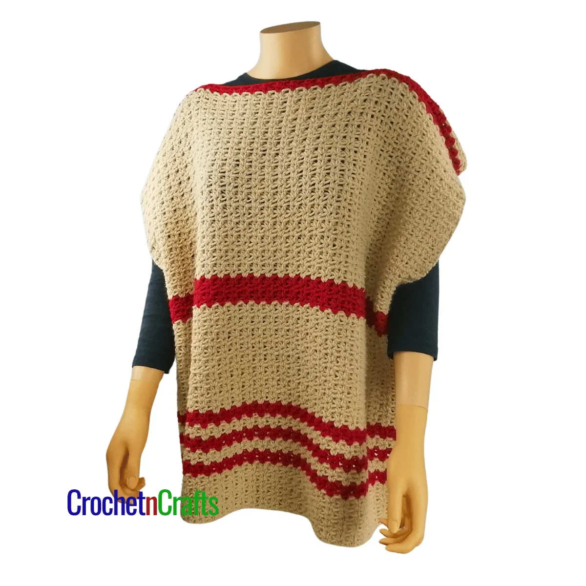 Crochet poncho shown on a mannequin.