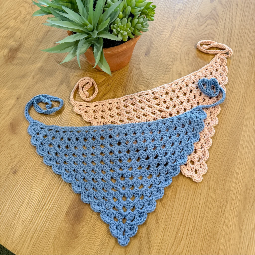 2 crochet granny bandanas laid on a table