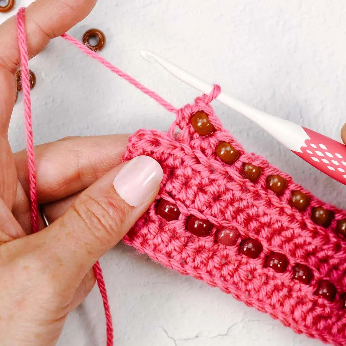 Demonstration of half double crochet through the back loop of the next stitch as usual.