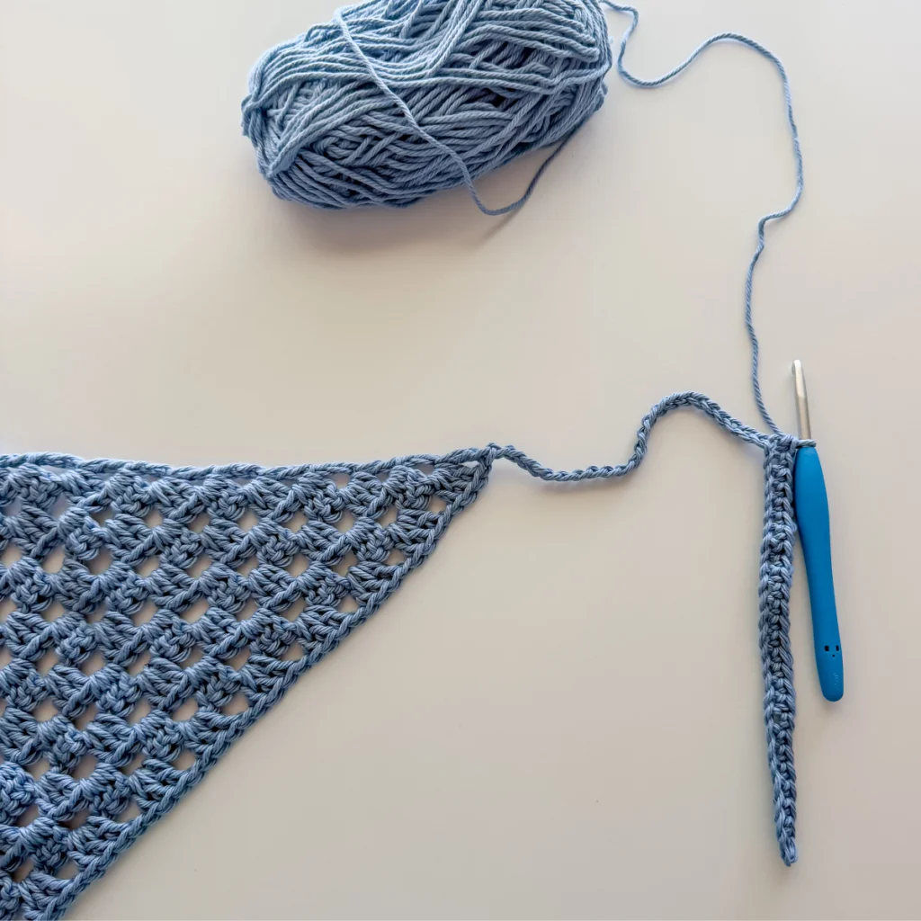showing how to single crochet the ties for the granny bandana