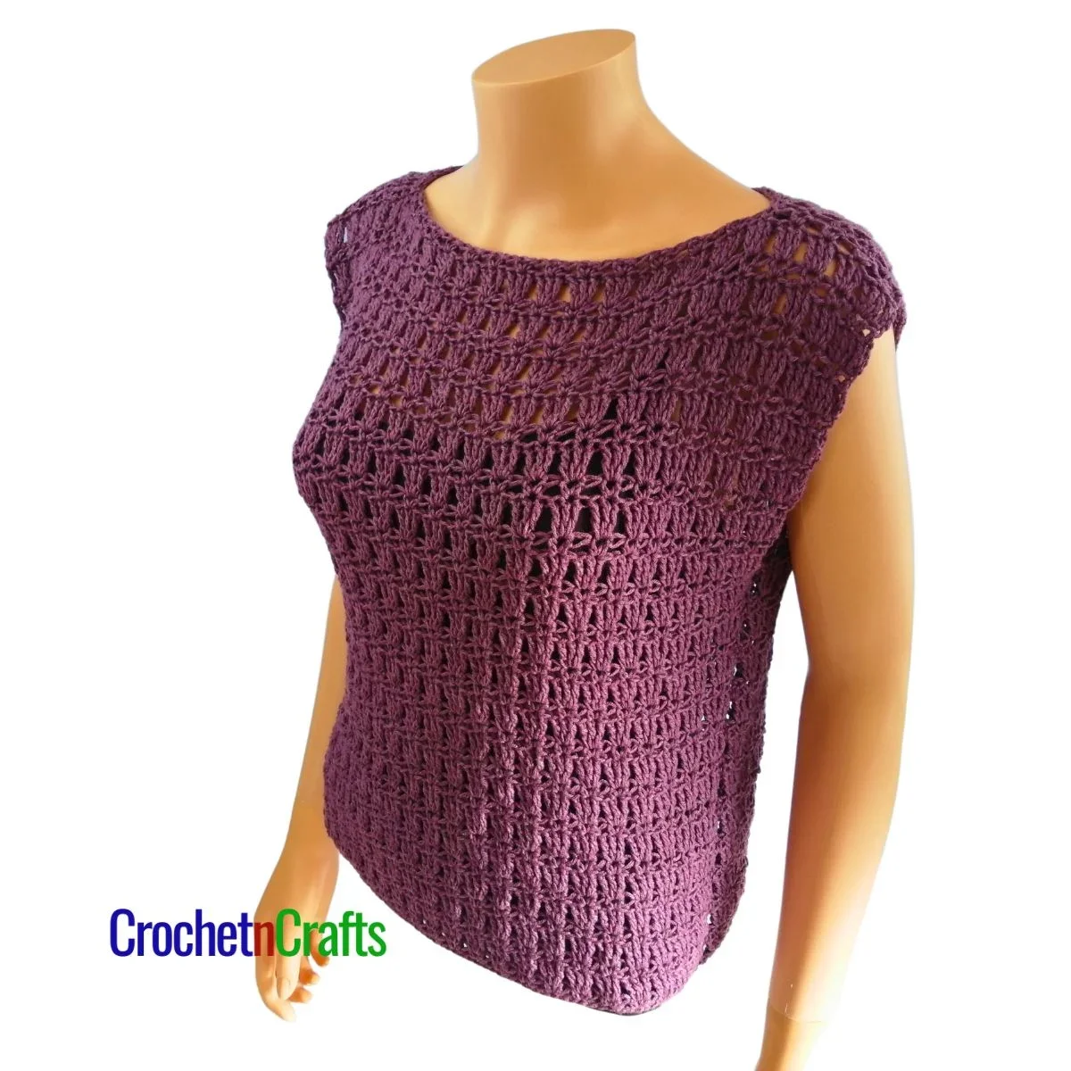 Crocheted sleeveless top modeled on a mannequin - side and top view