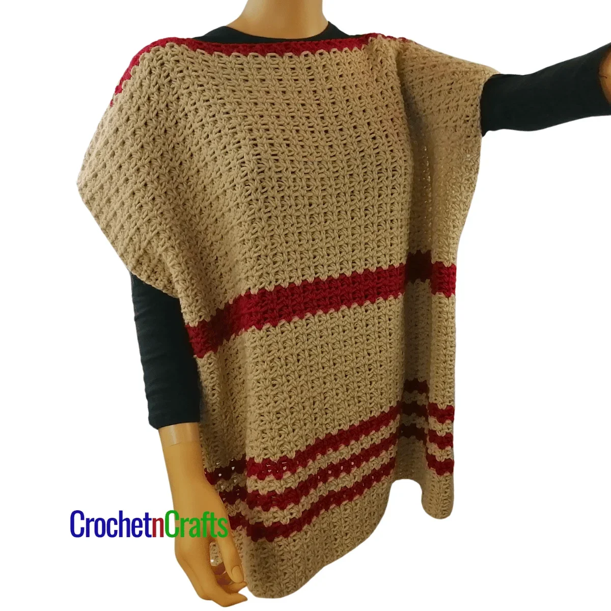 Crocheted poncho shown on a mannequin.