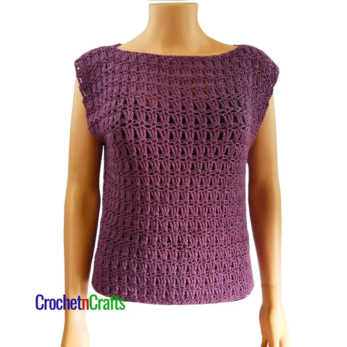 Crocheted sleeveless top modeled on a mannequin - front view
