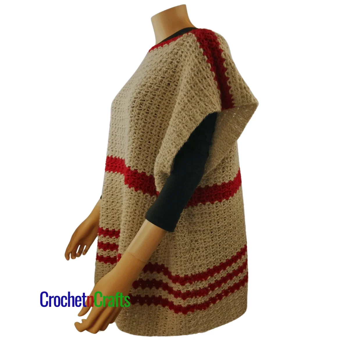 Crocheted poncho shown on a mannequin.